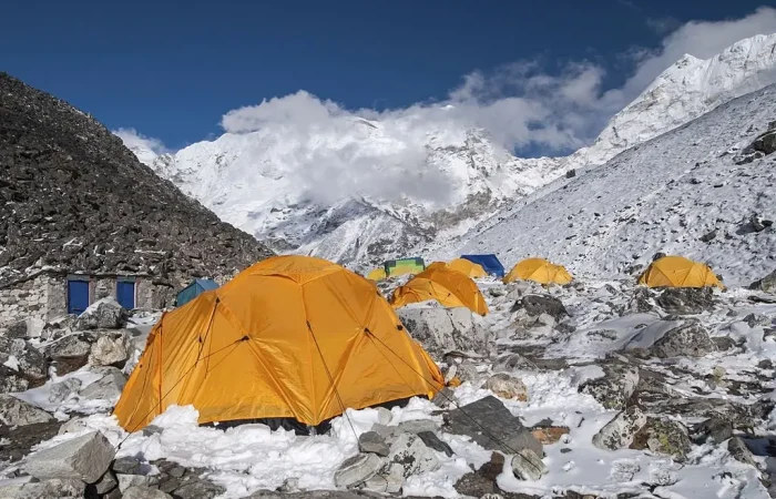 a group of tents in the snow
