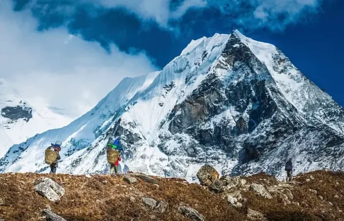 a person walking on a mountain