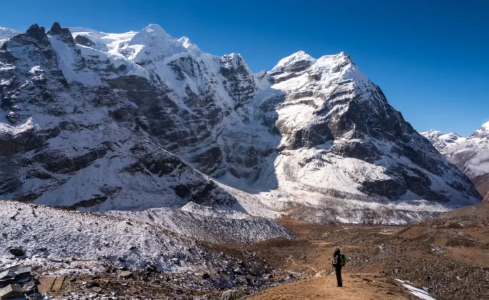 a person standing on a mountain
