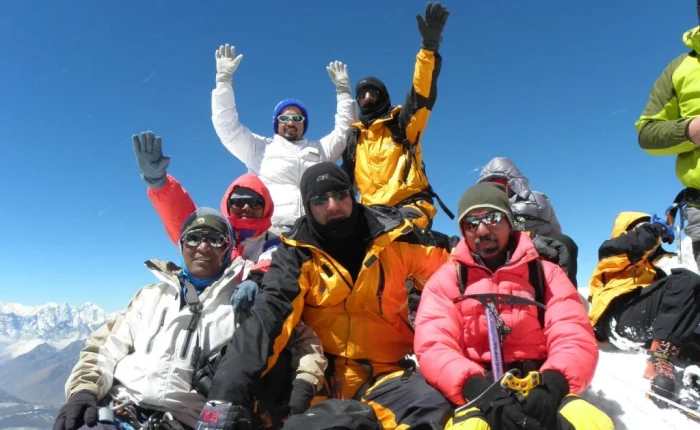 Island Peak climbing: a group of people in ski gear on a mountain