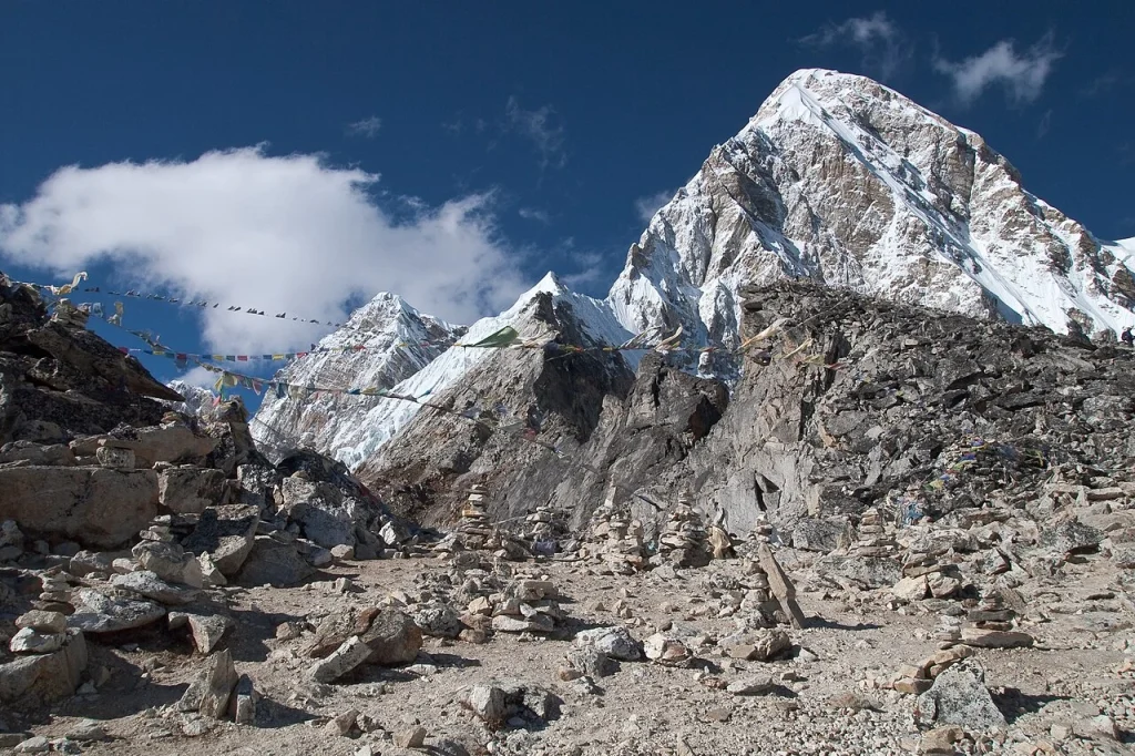a mountain range with a pile of rocks