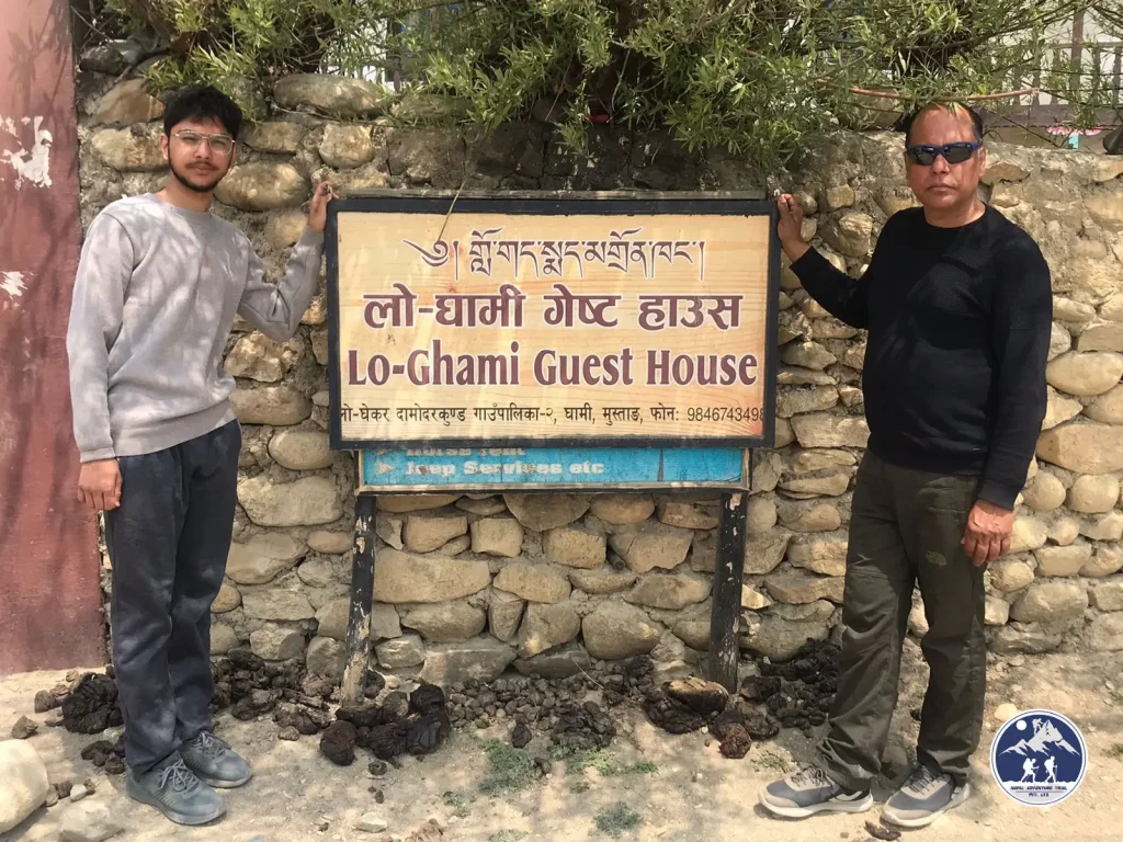 a man standing in front of a sign