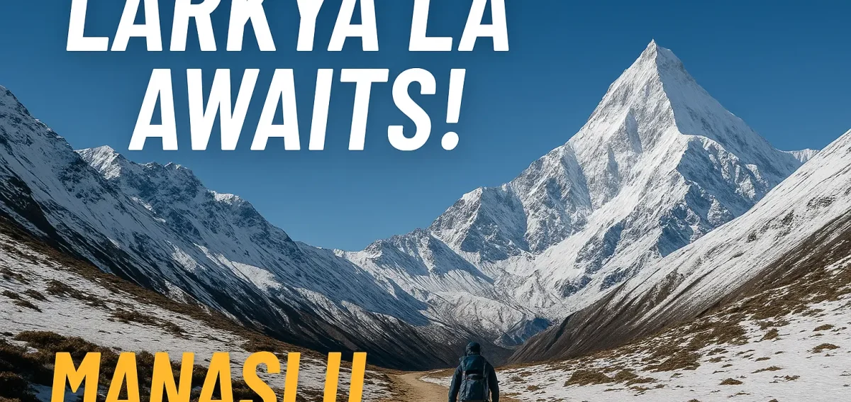 Snowy Larkya La Pass at 5,160 meters with Manaslu Mountain in the distance, inviting trekkers to the Manaslu Circuit Trek in Nepal.