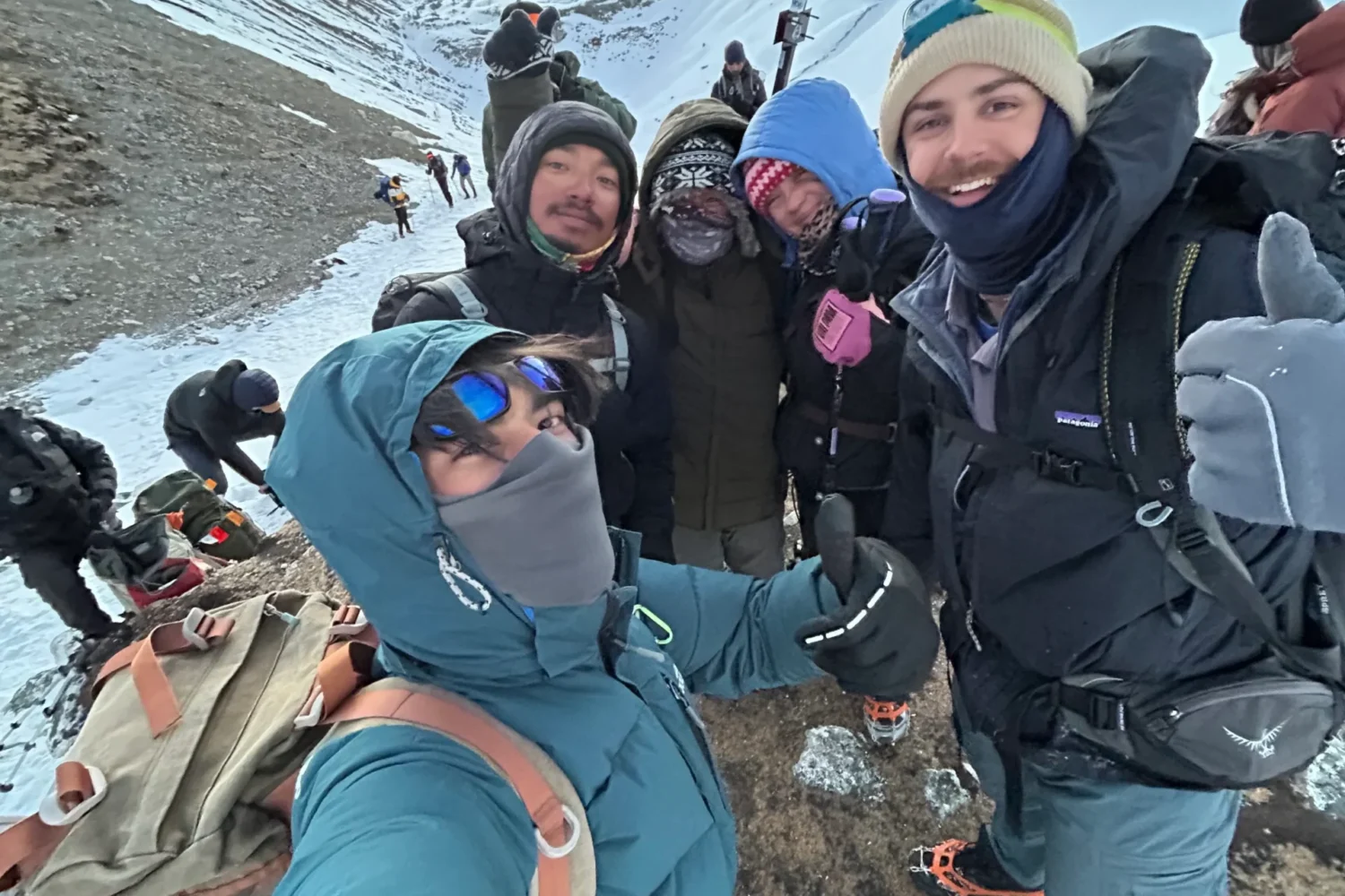 group of guests taking photo during mansalu circuit trek