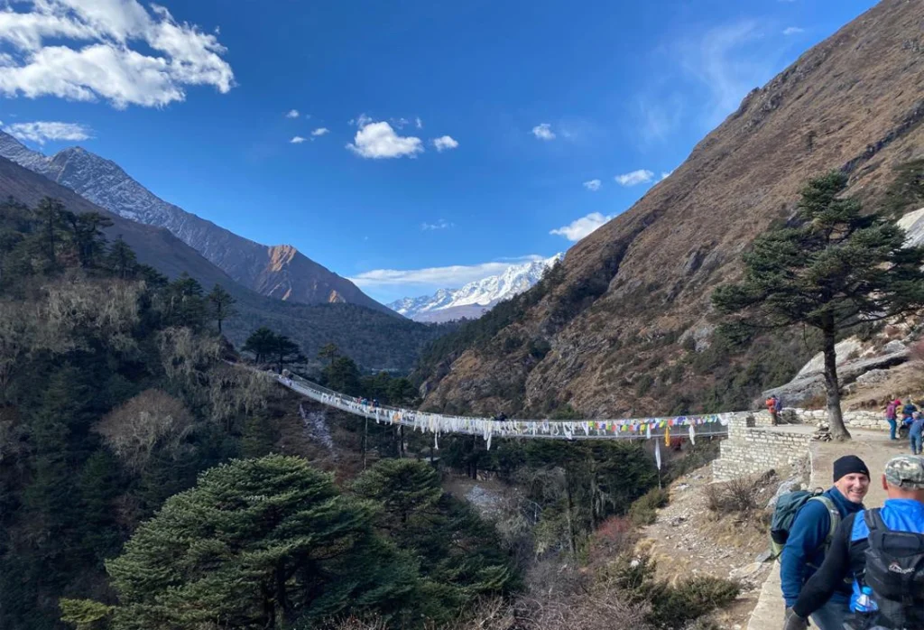 Suspension bridge on Mt. Everest Base Camp Trips – trekking over a river in the Everest region of Nepal.