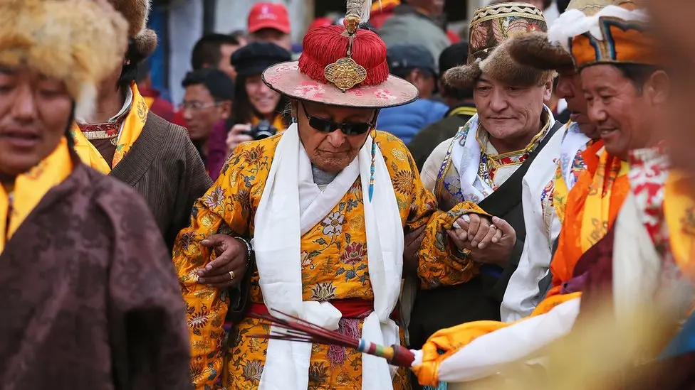 The last Lomanthang King, Jigme Dorje Palbar Bista, interacting with locals in Lo Manthang, Upper Mustang, Nepal