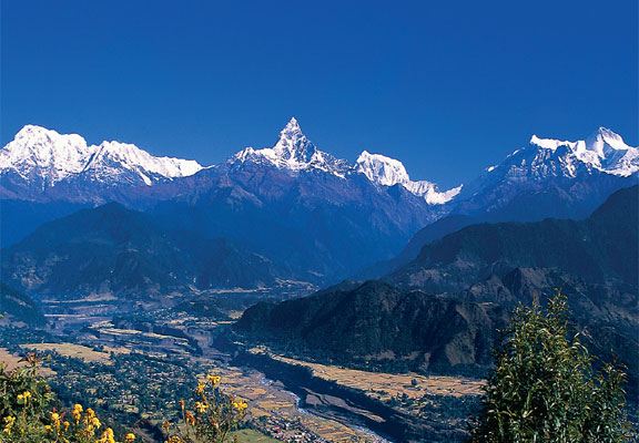 Distant view of a Himalayan mountain range in Nepal, the Himalayan country of stunning peaks and natural beauty.