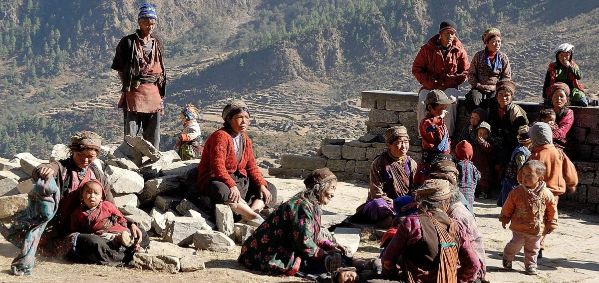 Tamang villagers posing together in a mountain village along the Tamang Heritage Trail, Nepal.