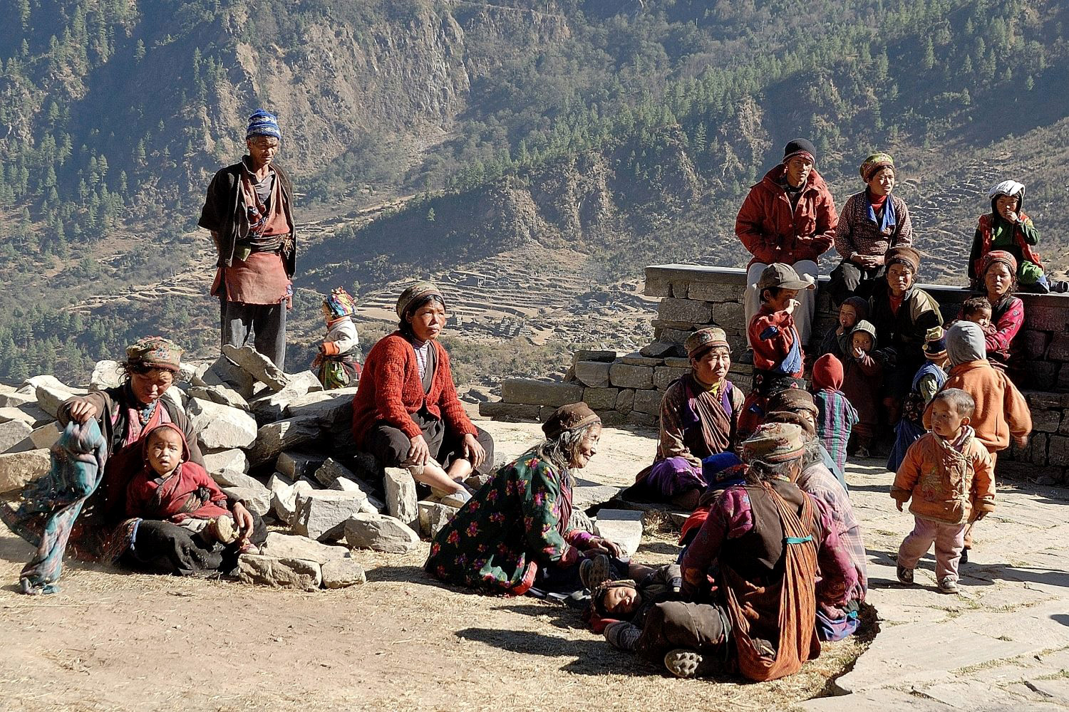 Tamang villagers posing together in a mountain village along the Tamang Heritage Trail, Nepal.
