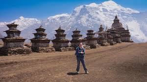 Trekker walking along a scenic trail in Nepal, exploring one of the best adventure trekking trails in Nepal