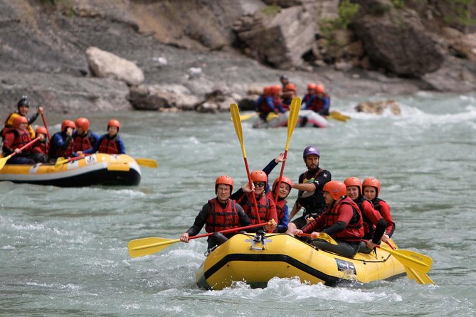 Tourists enjoying white-water rafting adventure in Nepal