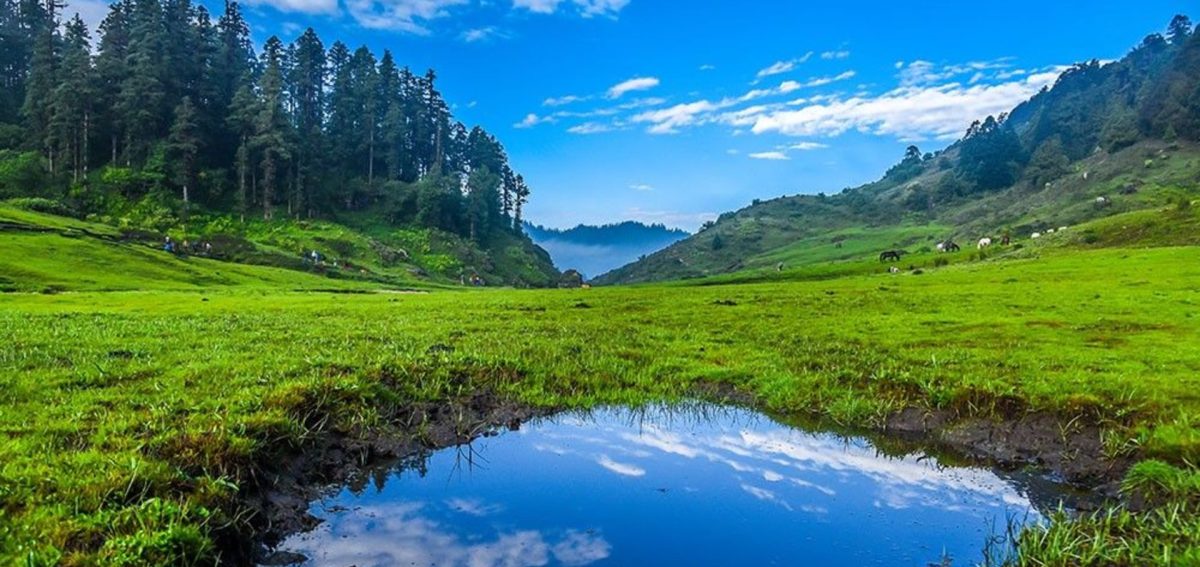 Khaptad meadow and lake in far western Nepal reflecting the beauty of far west trek Nepal