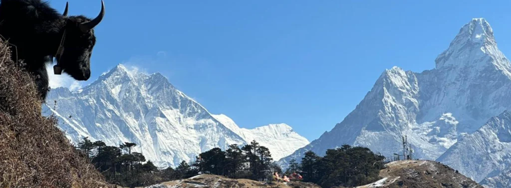 Mountain views during the Everest Base Camp trek with snow-covered Himalayan peaks, rugged valleys, and the trekking route to EBC through the Khumbu region