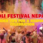 A group of friends laughing and covered in colorful powder during a high-energy Holi festival celebration in Nepal.