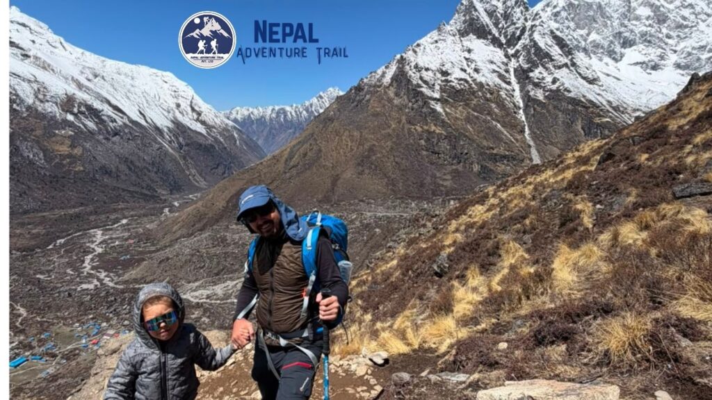 A trekker walking through the wide alpine landscape of the Langtang Valley during a beginner-friendly trekking in Nepal for beginners itinerary."