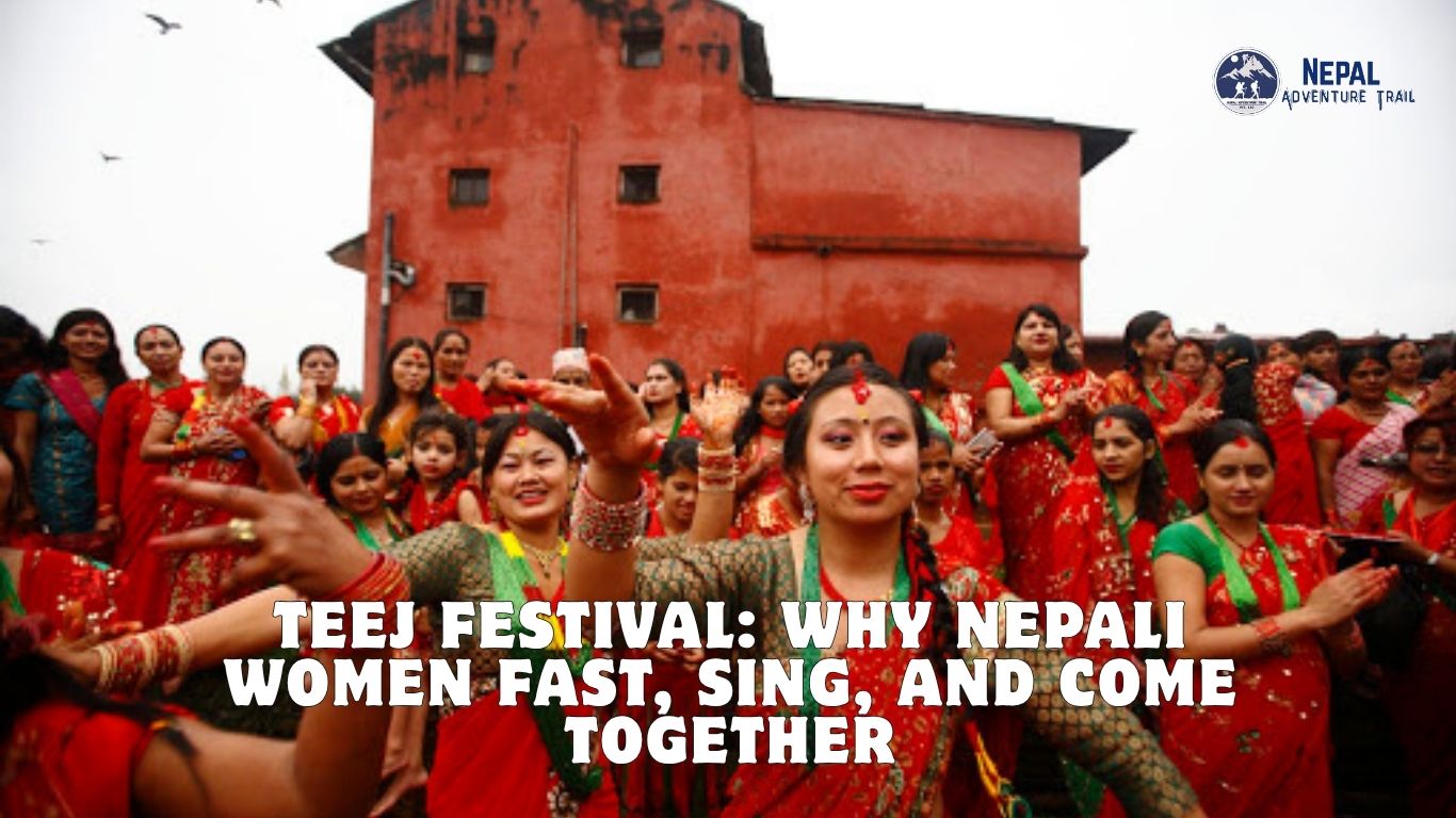 Teej Festival Nepal Nepali women dancing and celebrating in traditional red saris during the Teej festival.