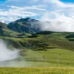 Sweeping panoramic views of the vast alpine meadows and sacred ridges along the Badimalika trek in Far-Western Nepal.