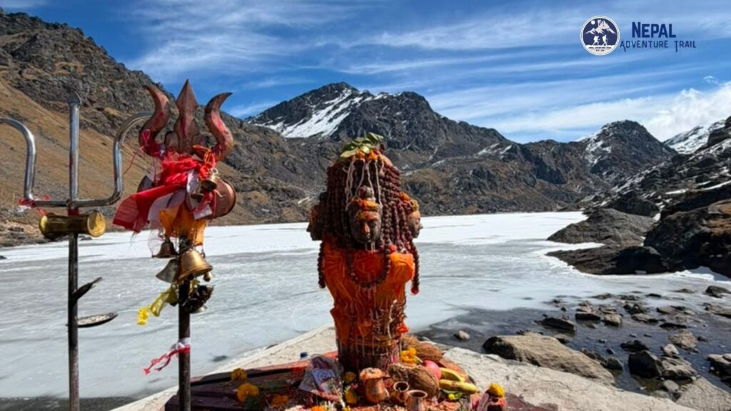 Traditional Shiva Linga monument located at the shore of the sacred Gosaikunda Lake in the Nepal Himalayas.