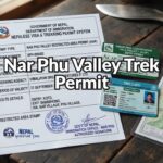 An official Nepal Government Restricted Area Permit document for the Nar Phu Valley trek, featuring applicant details, validity dates, and official stamps.