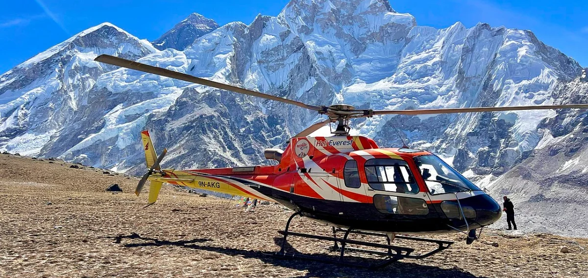 helicopter-tour-nepal-price-everest-base-camp-landing Airbus H125 helicopter tour Nepal landing at Kala Patthar 5545m facing Mount Everest